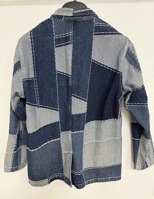 Blazer de denim com elementos Jacquard da moda para um visual ousado e elegante